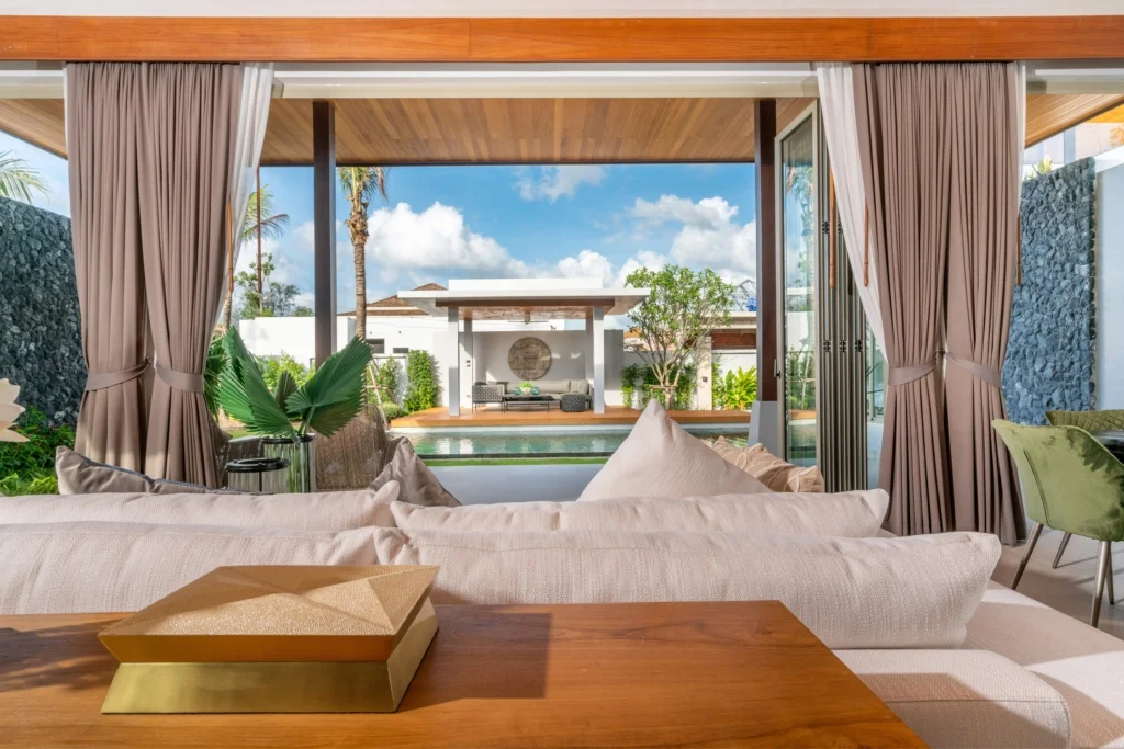 High-end living room - phuket villa, overlooking private garden with pool