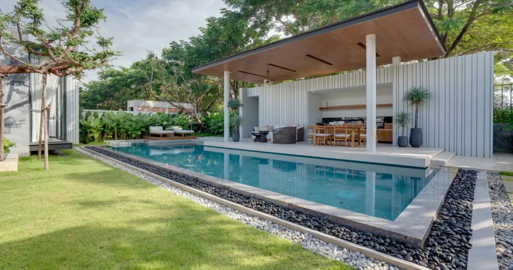 Tropical garden and pool view from modern villa in Phuket