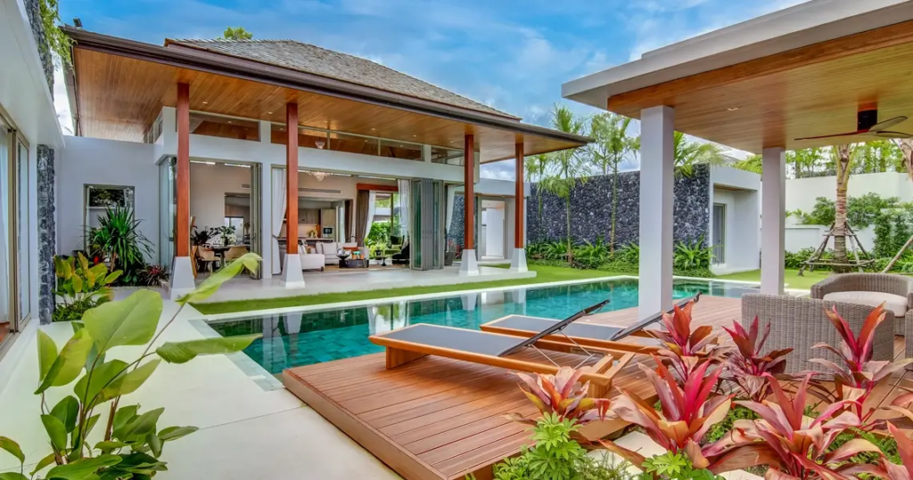 Private pool and tropical garden in luxury villa, Phuket
